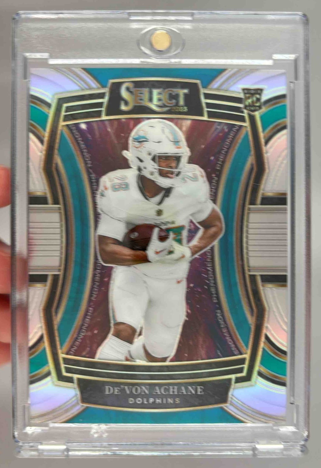 Card image for 2023 Panini Select De'Von Achane Phenomenon Silver Prizm #PH-DAC RC Dolphins