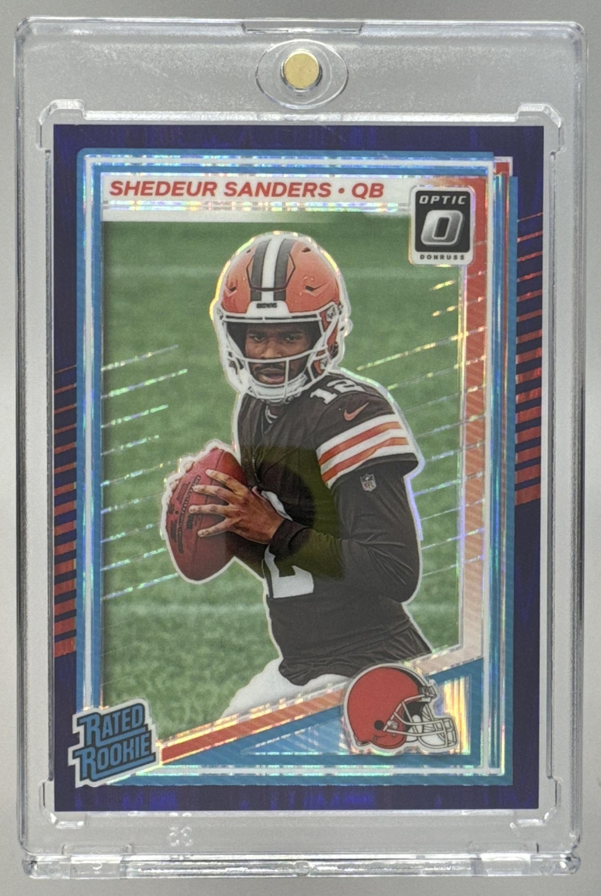 Card image for 2025 Panini Donruss Optic Shedeur Sanders Rated Rookie Purple Shock Prizm #203 Browns