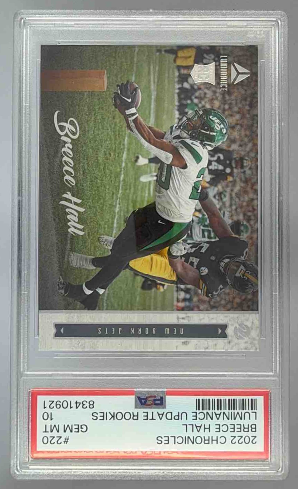 Card image for 2022 Panini Chronicles Breece Hall Luminance Update Rookies Black /35 #220 RC Jets