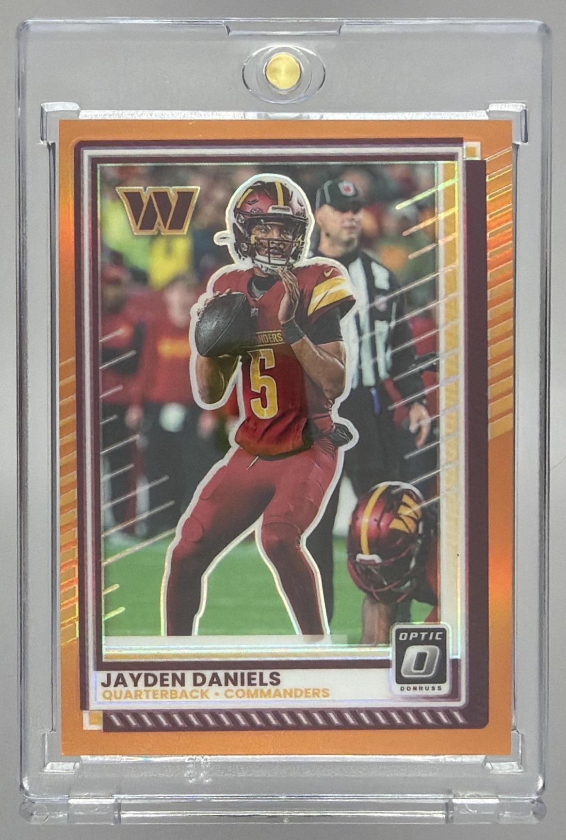 Card image for 2025 Panini Donruss Optic Jayden Daniels Orange Prizm /299 #23 Commanders