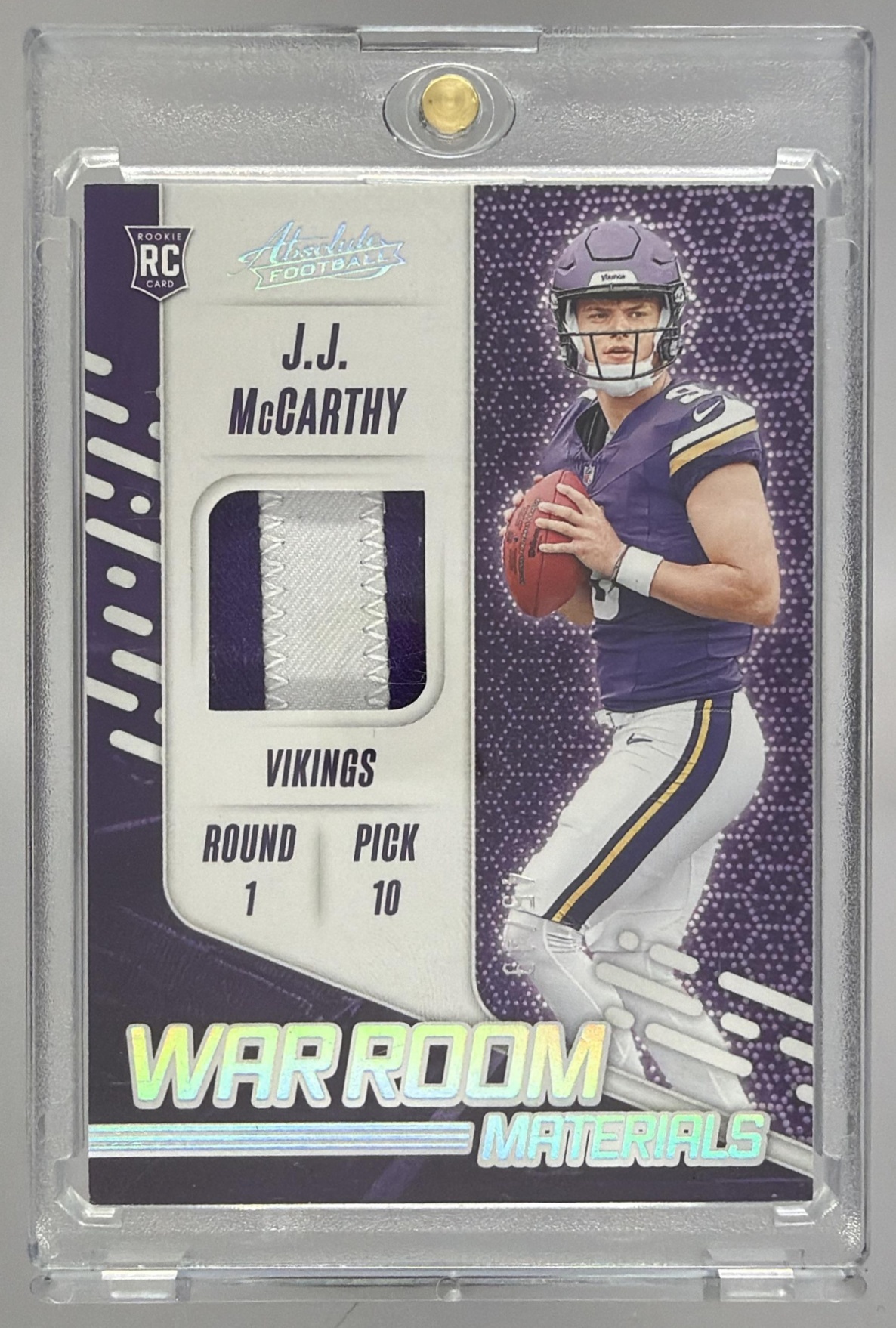 Card image for 2024 Panini Absolute J.J. McCarthy War Room Materials /199 #WRM-JMY MEM RC Vikings