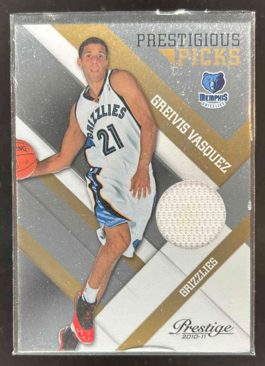 Card image for 2010-11 Panini Prestige Greivis Vasquez Prestigious Picks Materials Gold /99 #27 RC