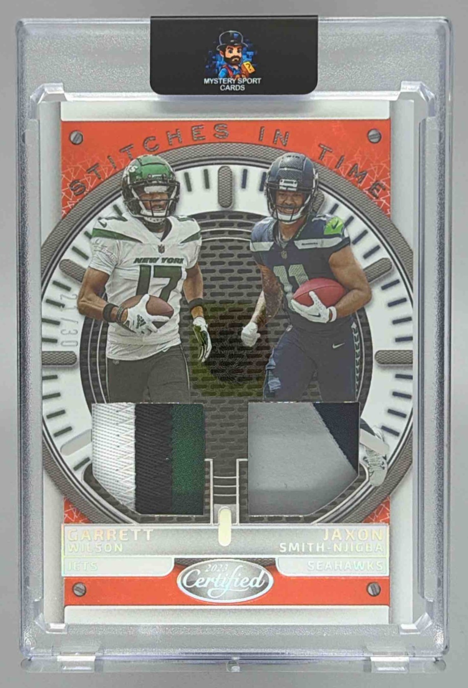 Card image for 2023 Panini Certified Garrett Wilson Jaxon Smith-Njigba Stitches in Time Dual Mirror Orange Etch /30 #SITD-2 MEM Jets Seahawks