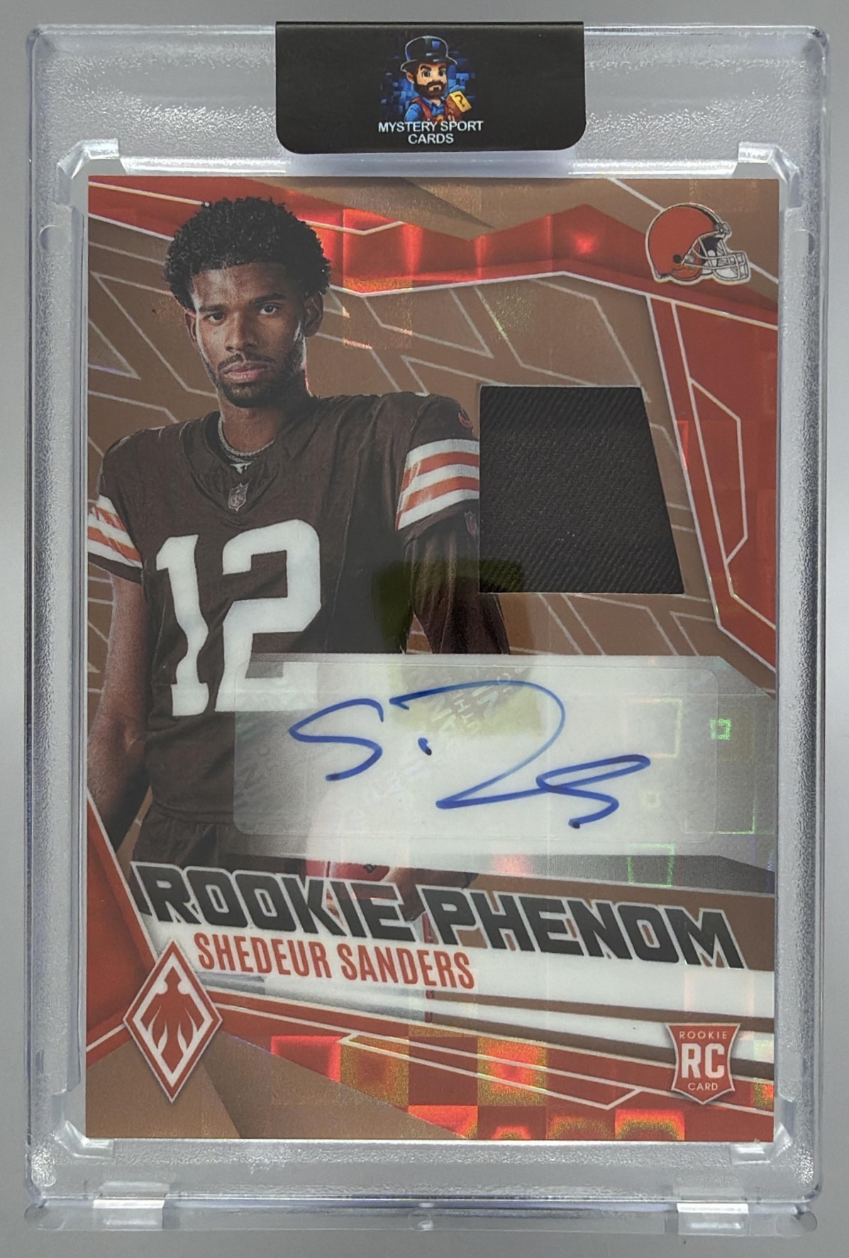 Card image for 2025 Panini Phoenix Shedeur Sanders Rookie Phenoms Jersey Auto Bronze Pandora Prizm /199 #RPJ-SSS MEM RC Browns
