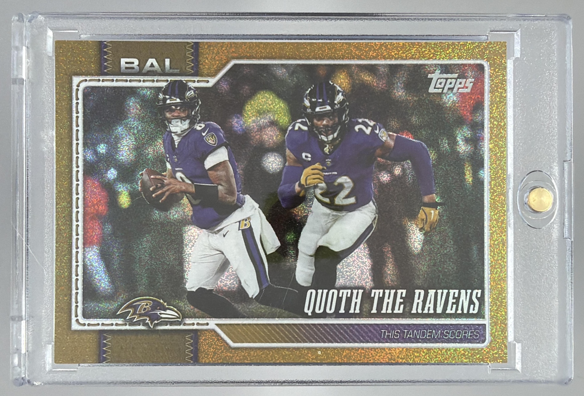 Card image for 2026 Topps Quoth The Ravens Sandglitter Gold /50 #300 Combo Card