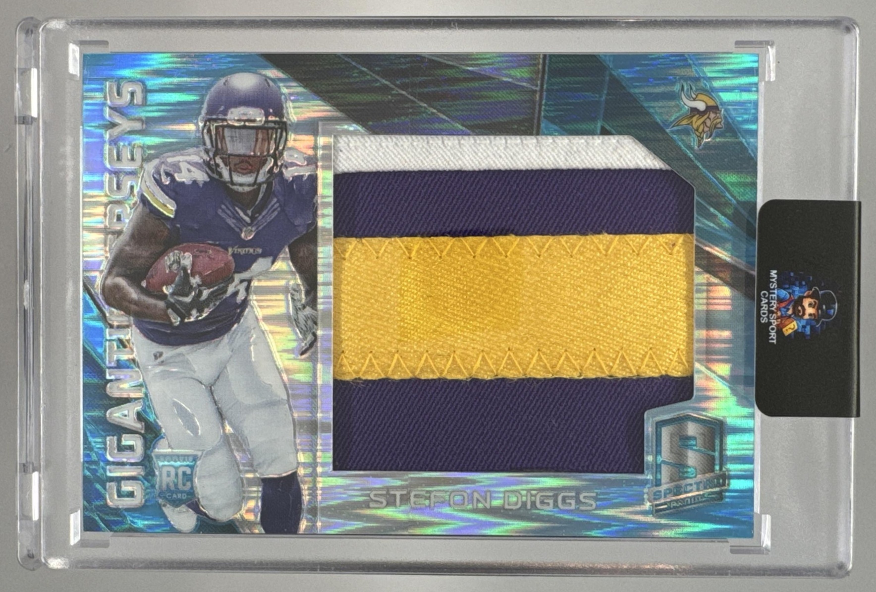 Card image for 2015 Panini Spectra Stefon Diggs Gigantic Jerseys Gold Nike Brand Logo 1/1 #GJ-SD MEM RC Vikings