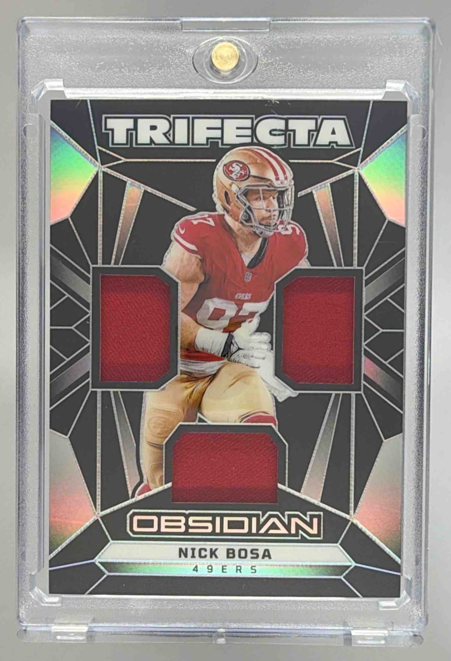 Card image for 2024 Panini Obsidian Nick Bosa Trifecta Swatches #TS-NBA MEM 49ers