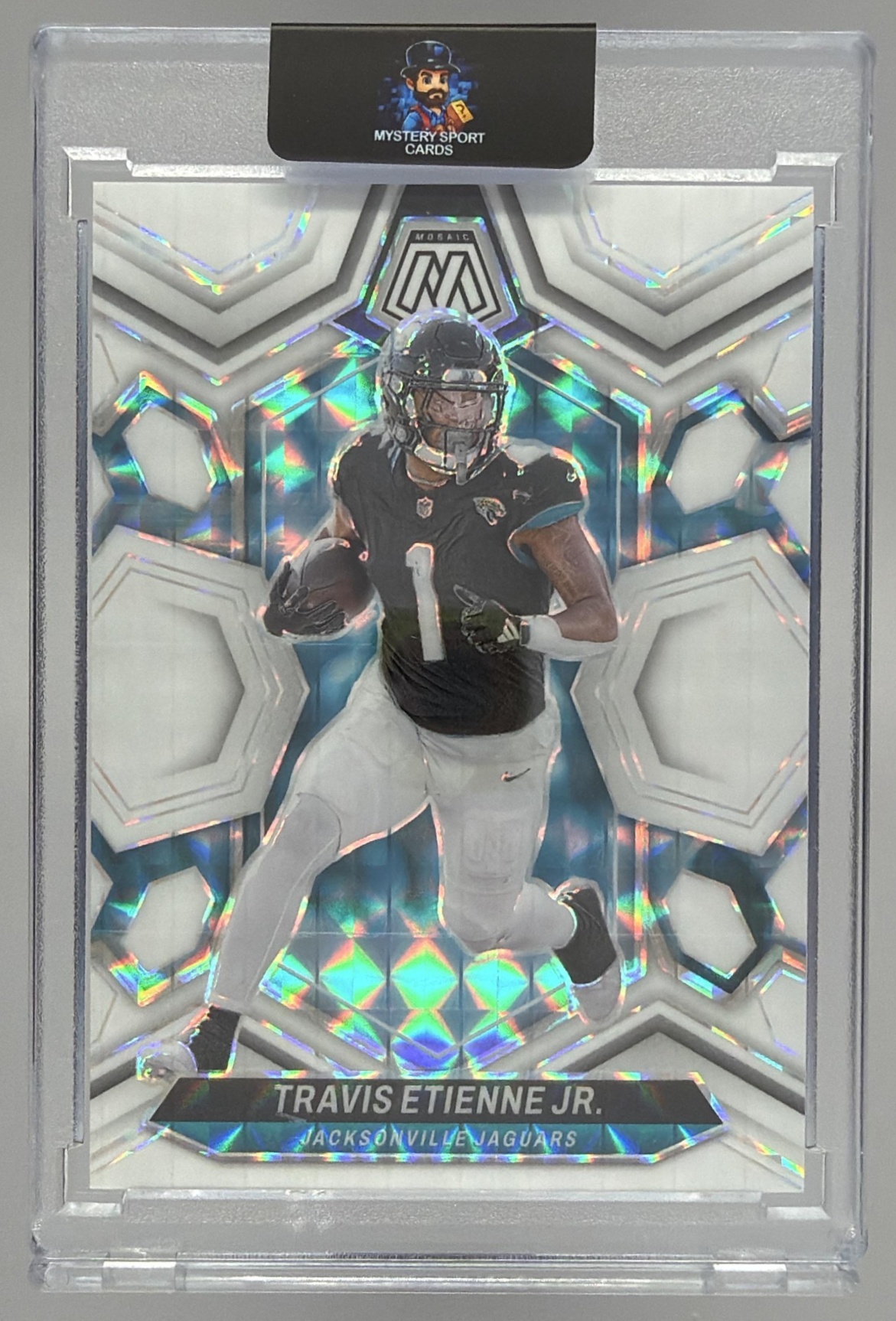 Card image for 2024 Panini Mosaic Travis Etienne Jr. White Prizm /25 #100 Jaguars
