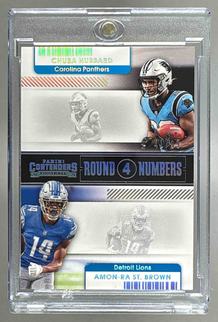 Card image for 2021 Panini Contenders Chuba Hubbard Amon-Ra St. Brown Round Numbers Silver /99 #RN-CHU Jaguars Panthers Lions