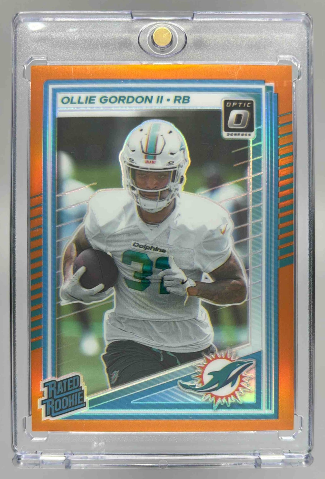 Card image for 2025 Panini Donruss Optic Ollie Gordon II Rated Rookie Orange Prizm /299 #218 Dolphins