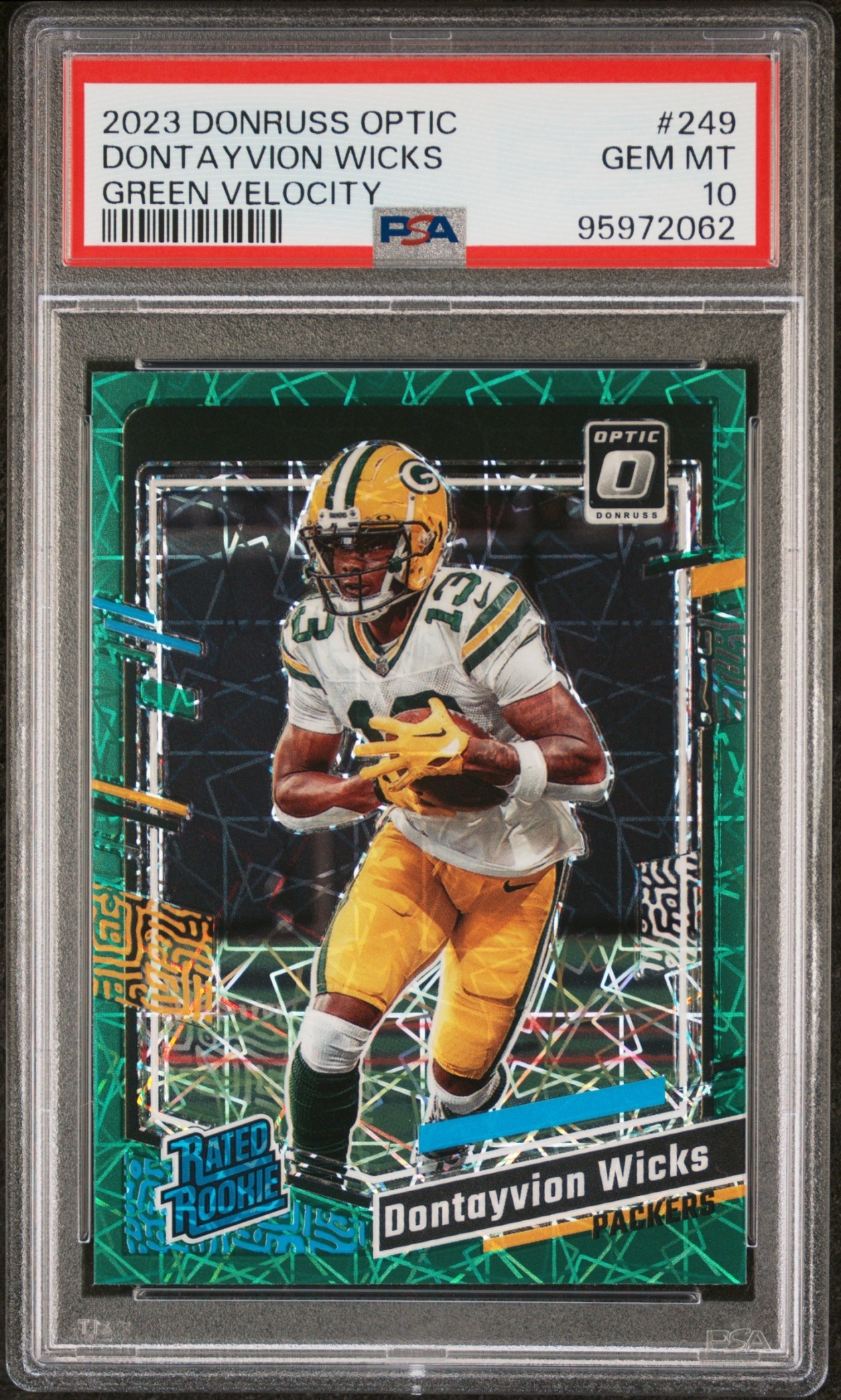 Card image for 2023 Panini Donruss Optic Dontayvion Wicks Green Velocity Prizm #249 RC Rated Rookie Packers