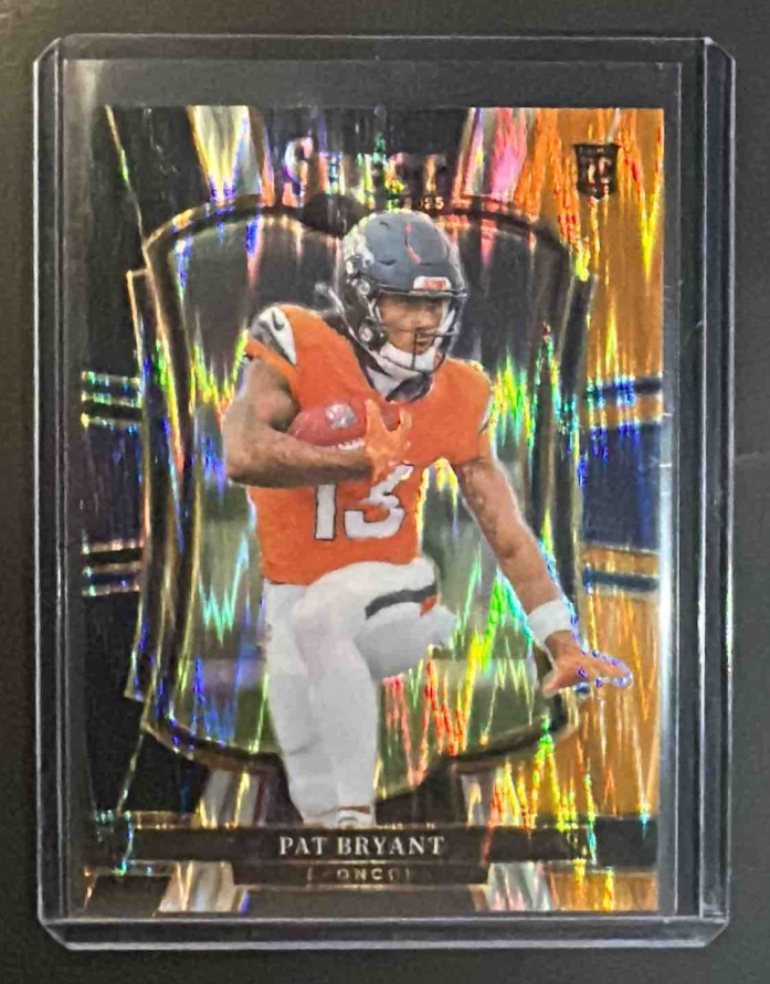 Card image for 2025 Panini Select Pat Bryant #112 Premier Level Black and Orange Prizm Shock RC