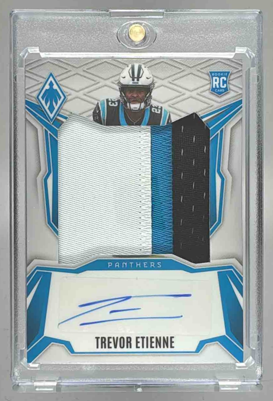 Card image for 2025 Panini Phoenix Trevor Etienne RPS Rookie Patch Auto /199 #3 MEM RC Panthers