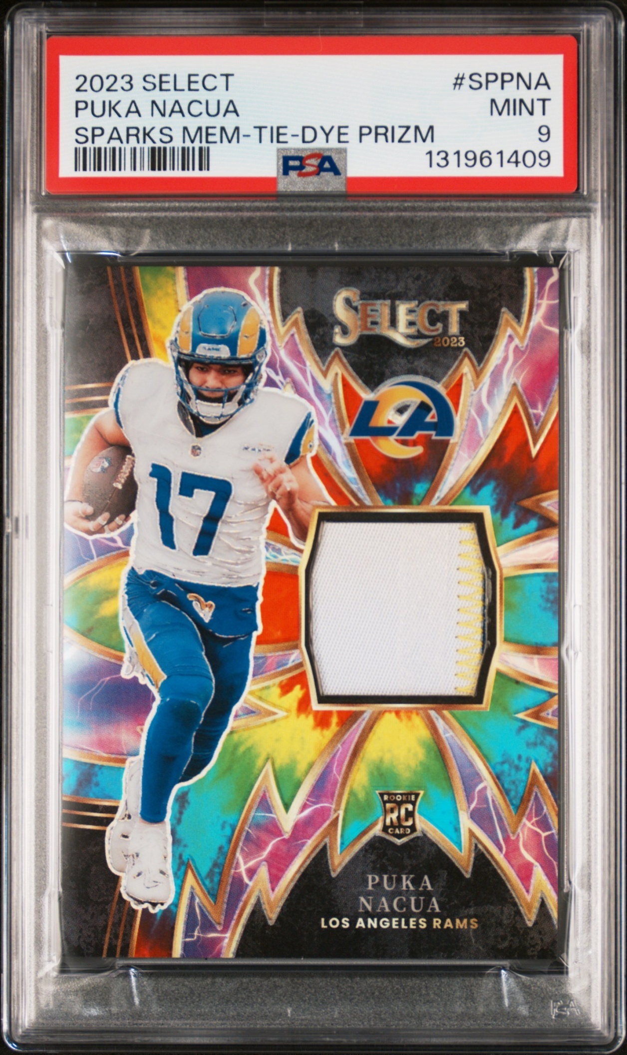 Card image for 2023 Panini Select Puka Nacua Sparks Tie Dye Prizm /75 #SP-PNA RC MEM Rams