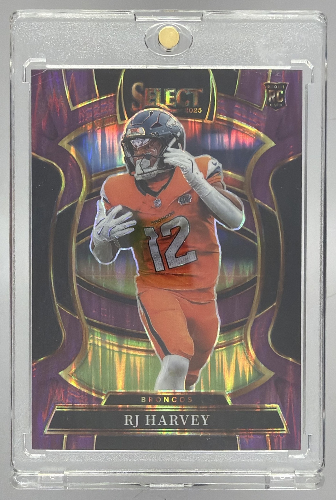 Card image for 2025 Panini Select RJ Harvey Concourse Neon Green Prizm Shock /699 #10 RC Broncos