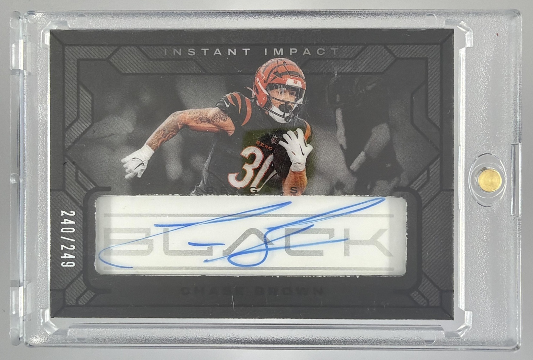 Card image for 2024 Panini Black Chase Brown Instant Impact Ink /249 #III-CBN Auto Bengals