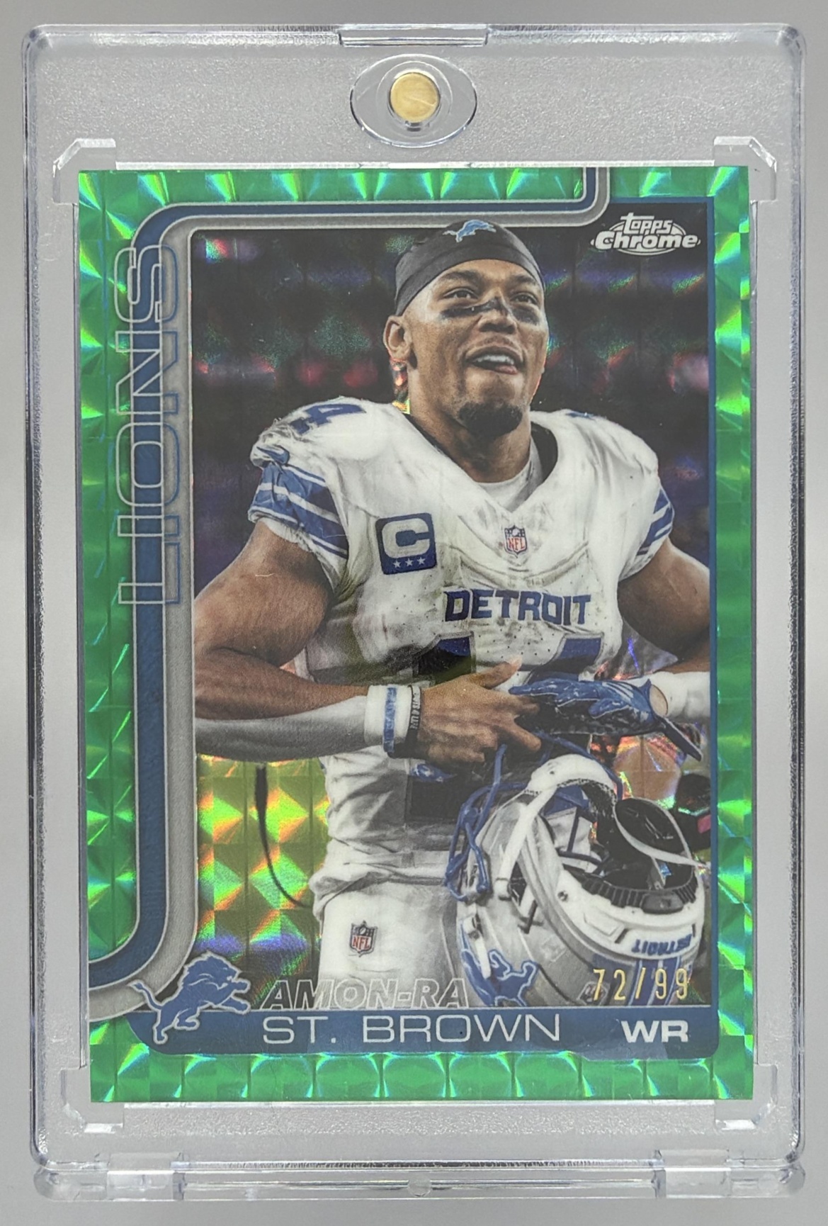 Card image for 2025 Topps Chrome Amon-Ra St. Brown Image Variation Green Geometric Refractor /99 #98 SP Lions