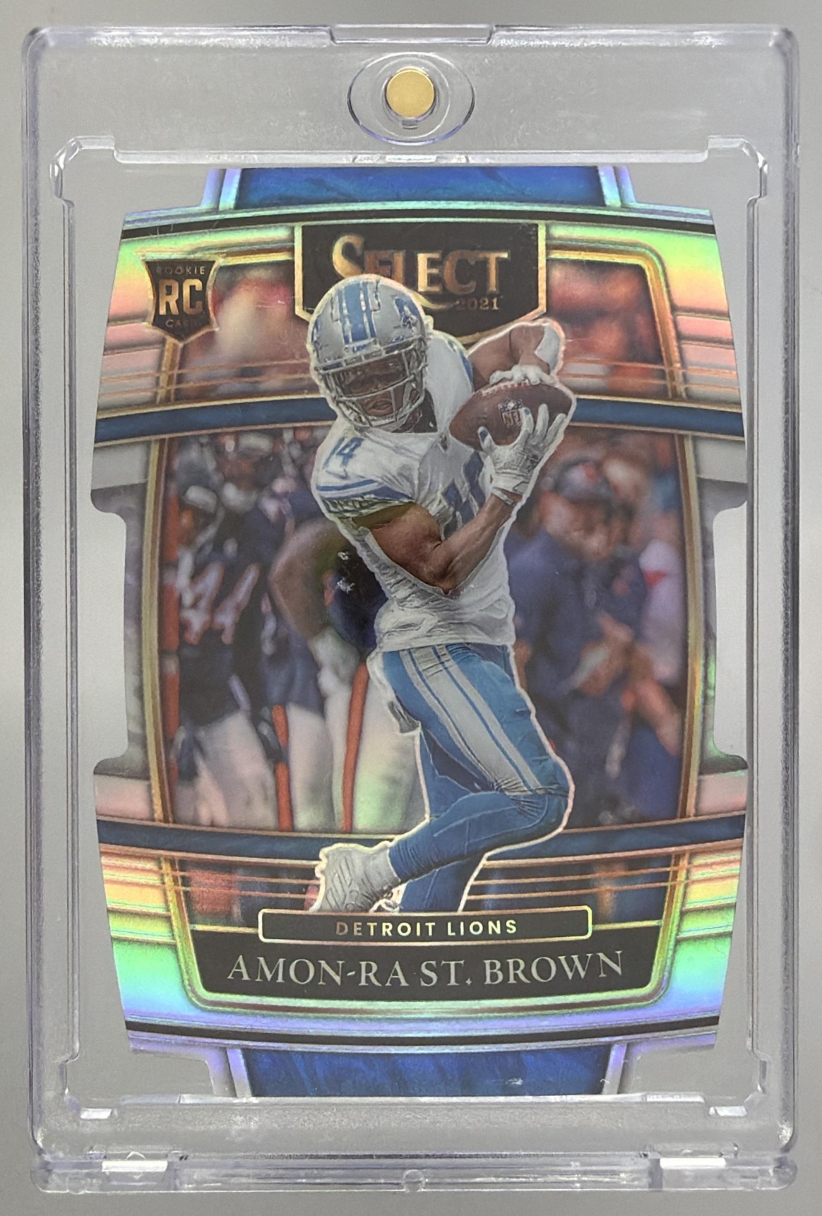 Card image for 2021 Panini Select Amon-Ra St. Brown Silver Prizm Die Cut #73 RC Concourse Lions