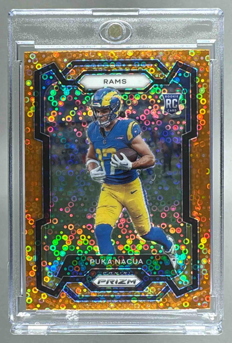 Card image for 2023 Panini Football Prizm Puka Nacua Orange Disco #357 RC Los Angeles Rams