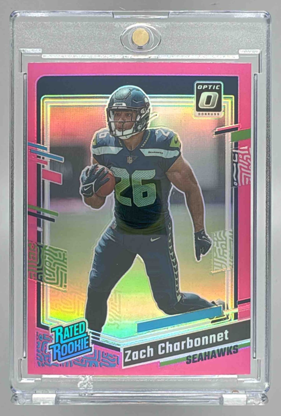Card image for 2023 Panini Donruss Optic Zach Charbonnet Pink Prizm #294 RC Rated Rookie Seahawks