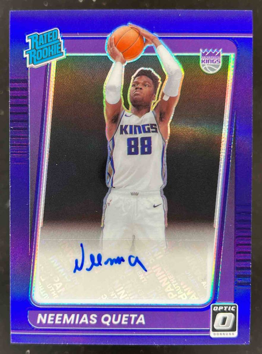Card image for 2021-22 Panini Donruss Optic Neemias Queta Rated Rookie Signatures Purple #156 RC Auto