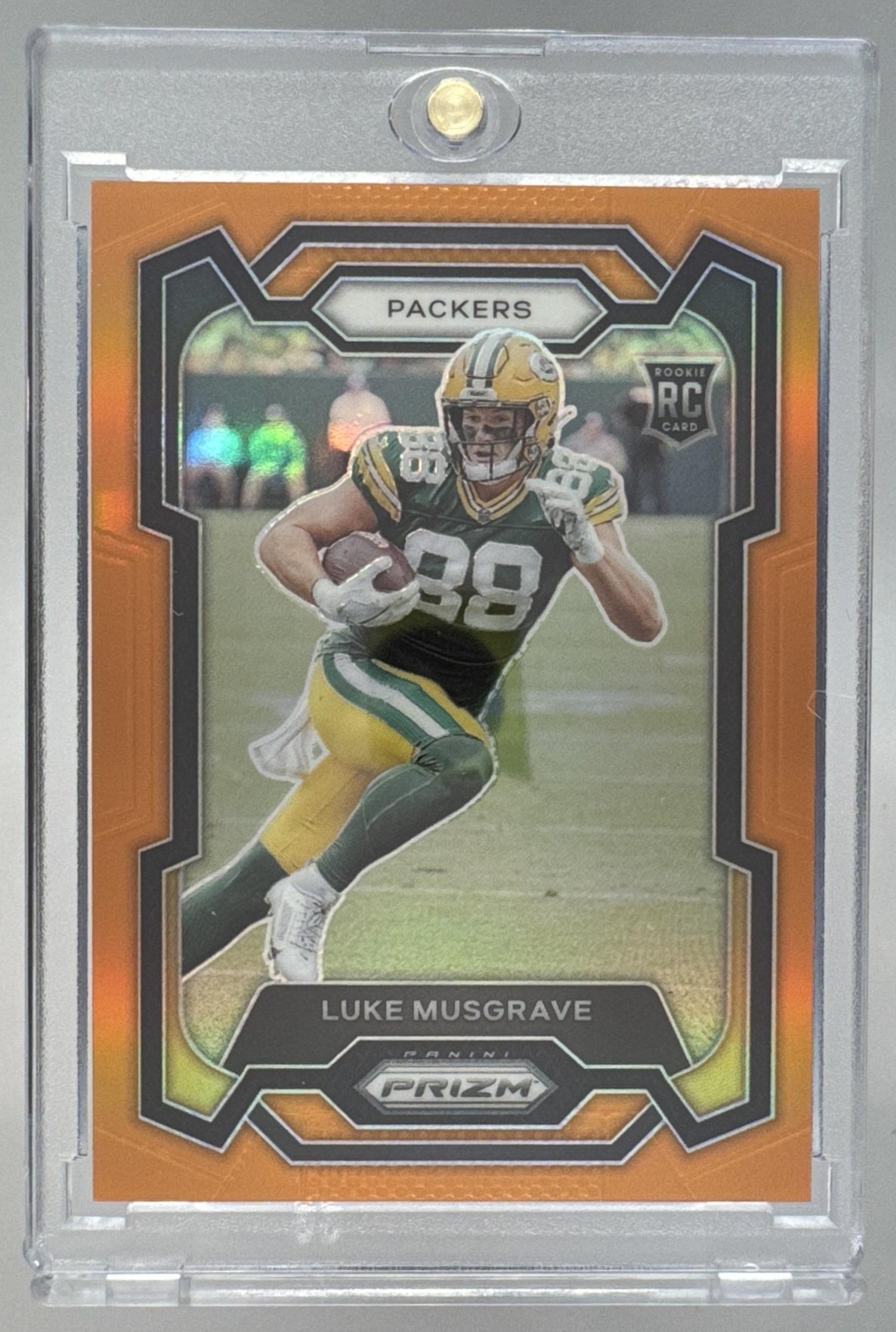 Card image for 2023 Panini Football Prizm Luke Musgrave Orange /249 #337 RC Green Bay Packers