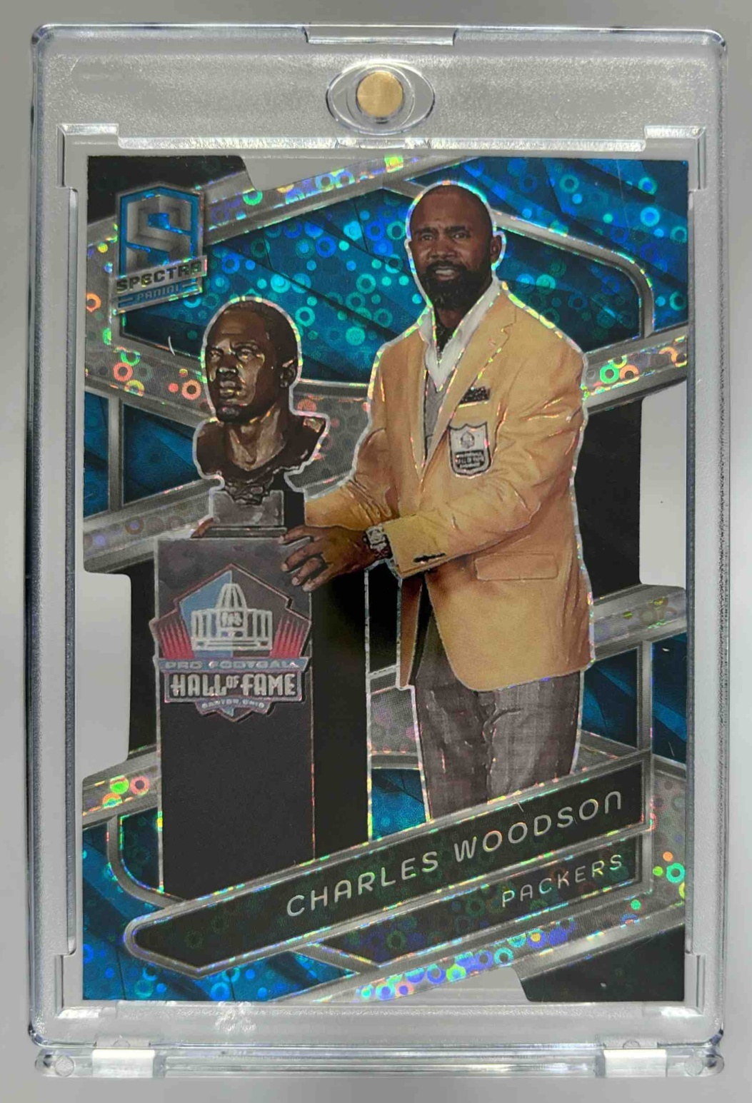 Card image for 2024 Panini Spectra Charles Woodson Neon Blue Die-Cut /50 #104 Packers