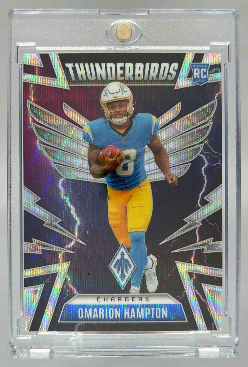 Card image for 2025 Panini Phoenix Omarion Hampton Thunderbirds Wave Prizm /299 #28 RC Chargers