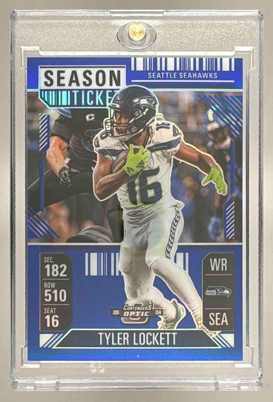 Card image for 2024 Panini Contenders Optic Tyler Lockett Season Ticket Blue Prizm /99 #50 Seahawks