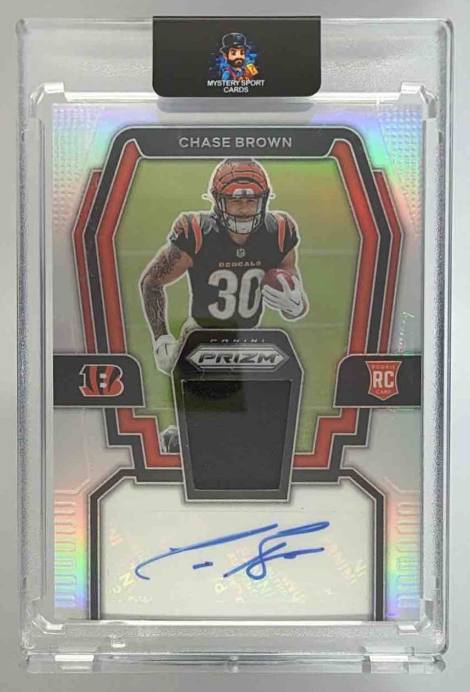 Card image for 2023 Panini Prizm Chase Brown Rookie Patch Auto Silver /99 #RPA-CB MEM RC Bengals