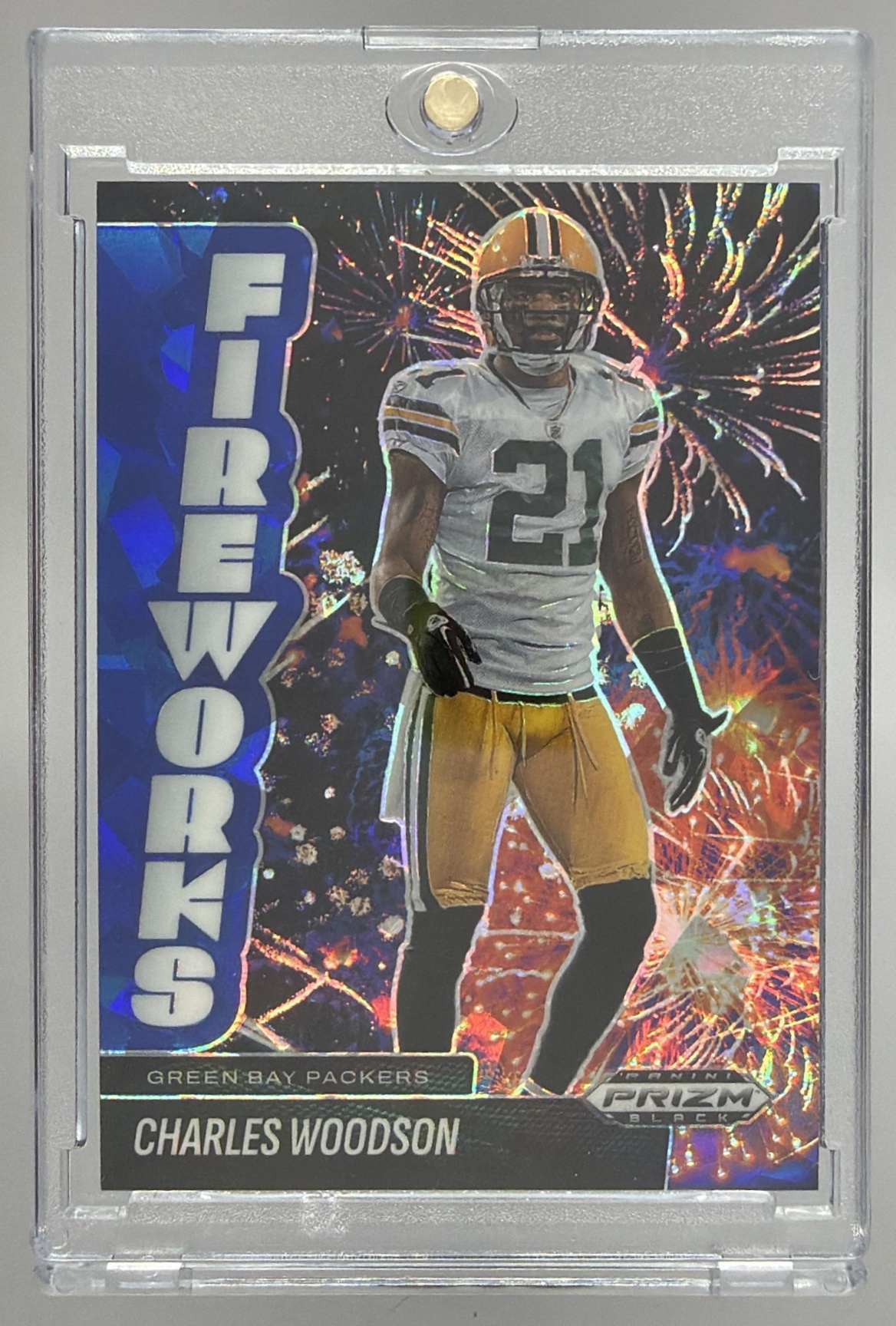 Card image for 2025 Panini Prizm Black Charles Woodson Fireworks Blue Ice /125 #21 Packers