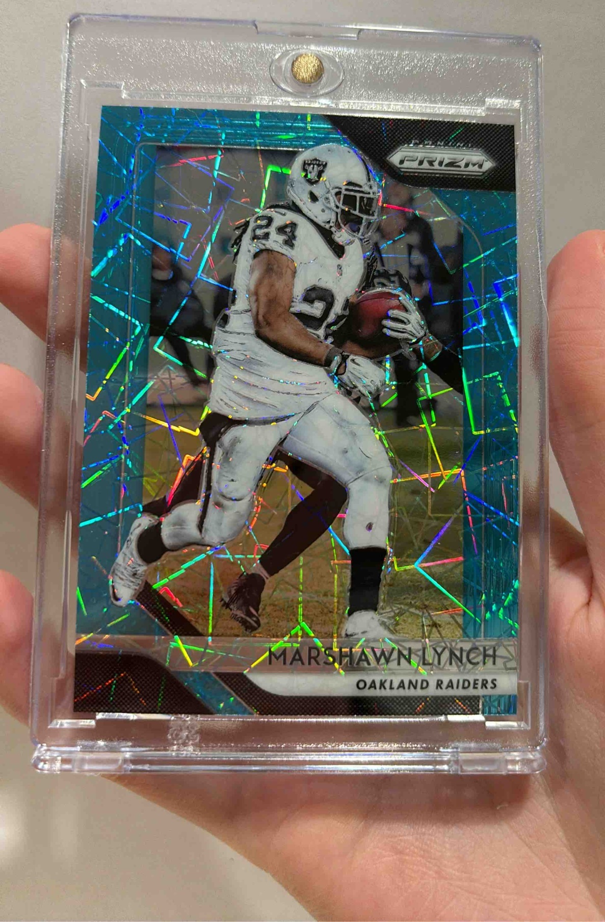 Card image for 2018 Panini Football Prizm Marshawn Lynch Blue #48 Oakland Raiders