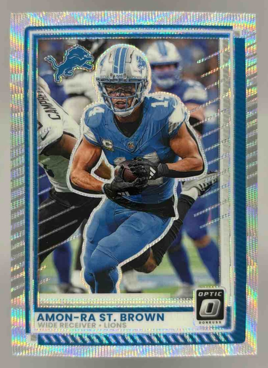 Card image for 2025 Panini Donruss Optic Amon-Ra St. Brown Wave Prizm /300 #63 Lions