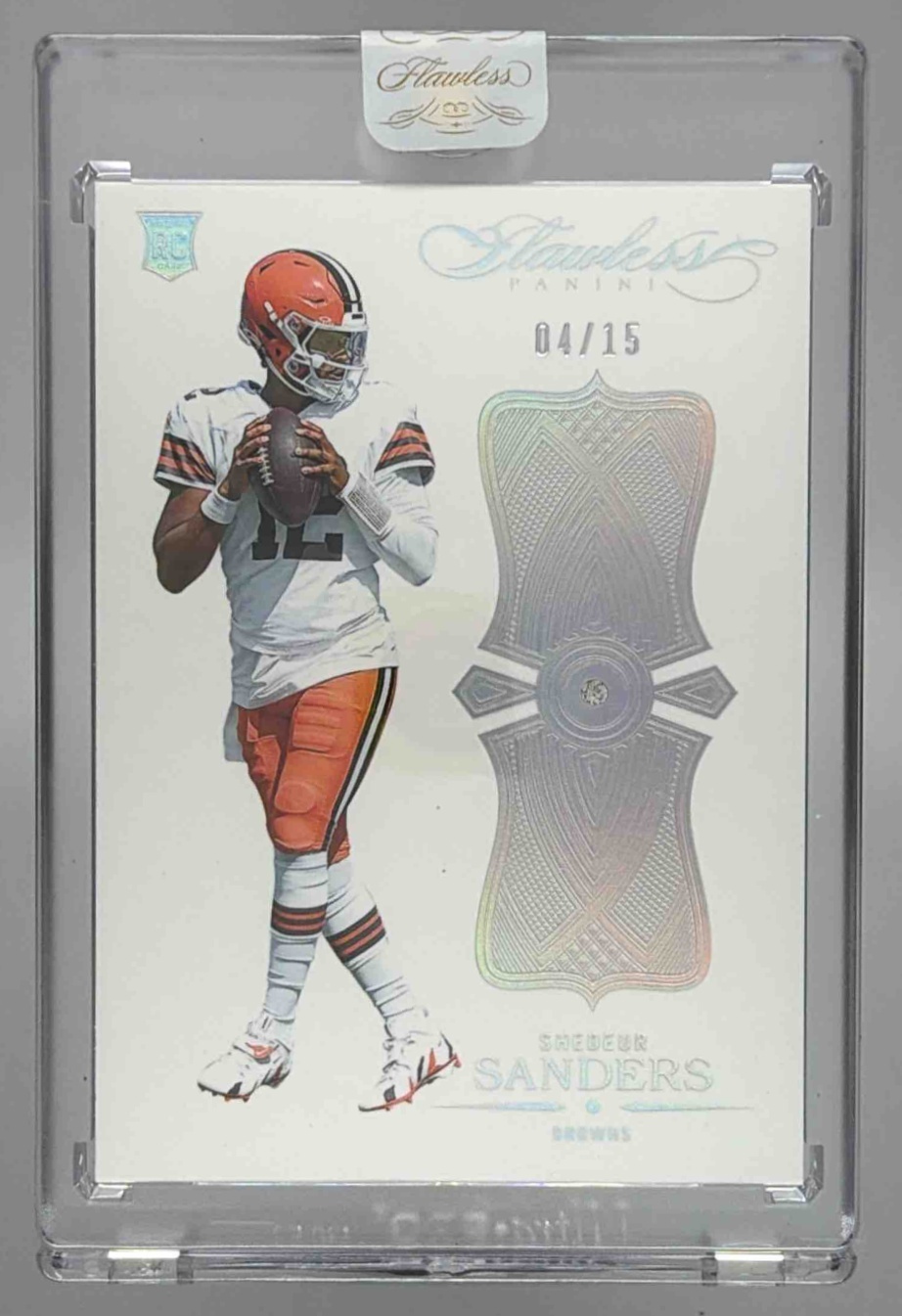 Card image for 2025 Panini Flawless Shedeur Sanders Rookie Showcase Ruby /15 #6 RC Browns