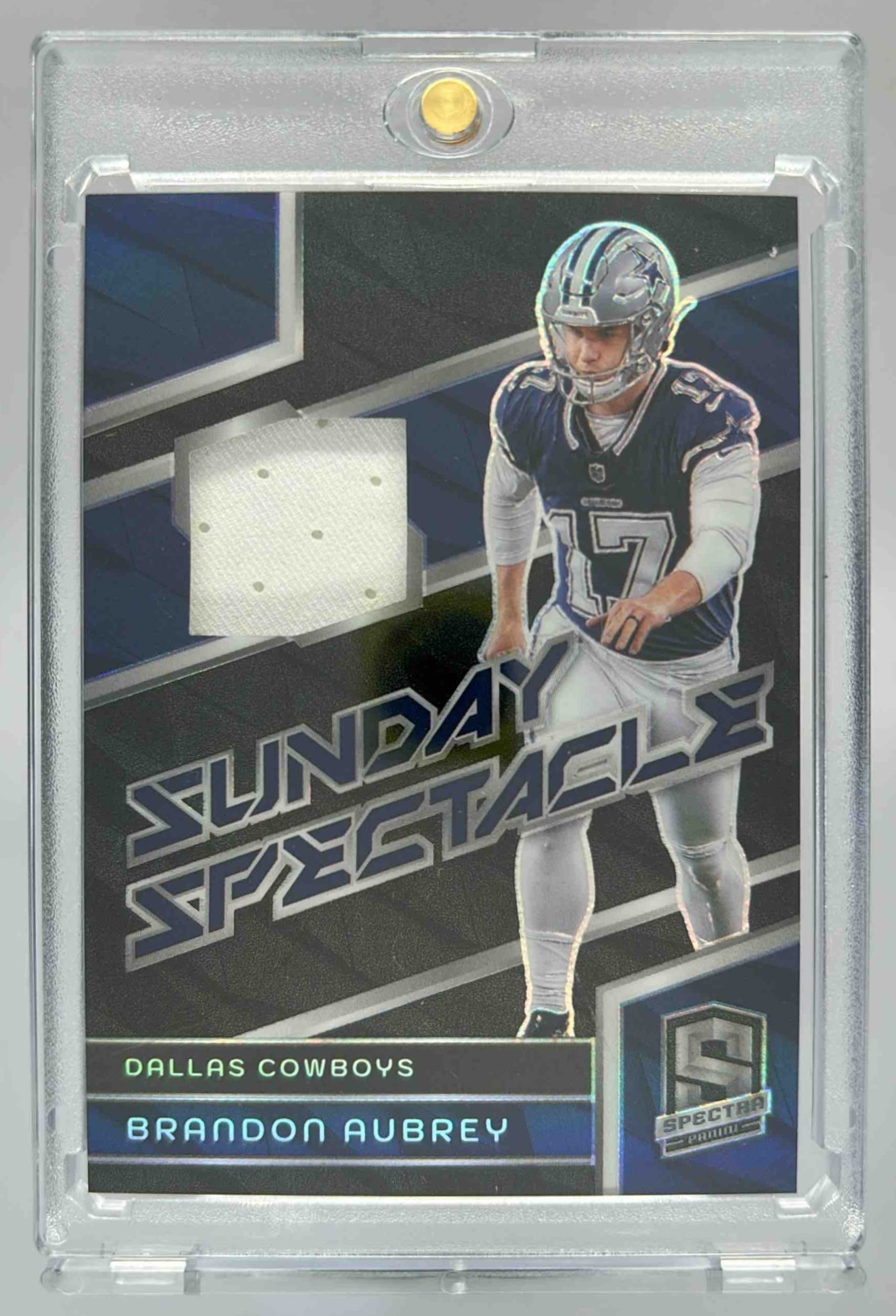 Card image for 2024 Panini Spectra Brandon Aubrey Sunday Spectacle /99 #SS-BAY Cowboys