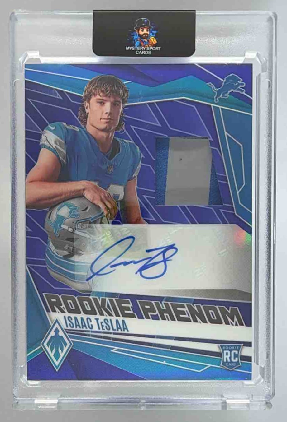 Card image for 2025 Panini Phoenix Isaac TeSlaa Rookie Phenoms Jersey Auto Blue Prizm /49 #RPJ-ITA MEM RC Lions