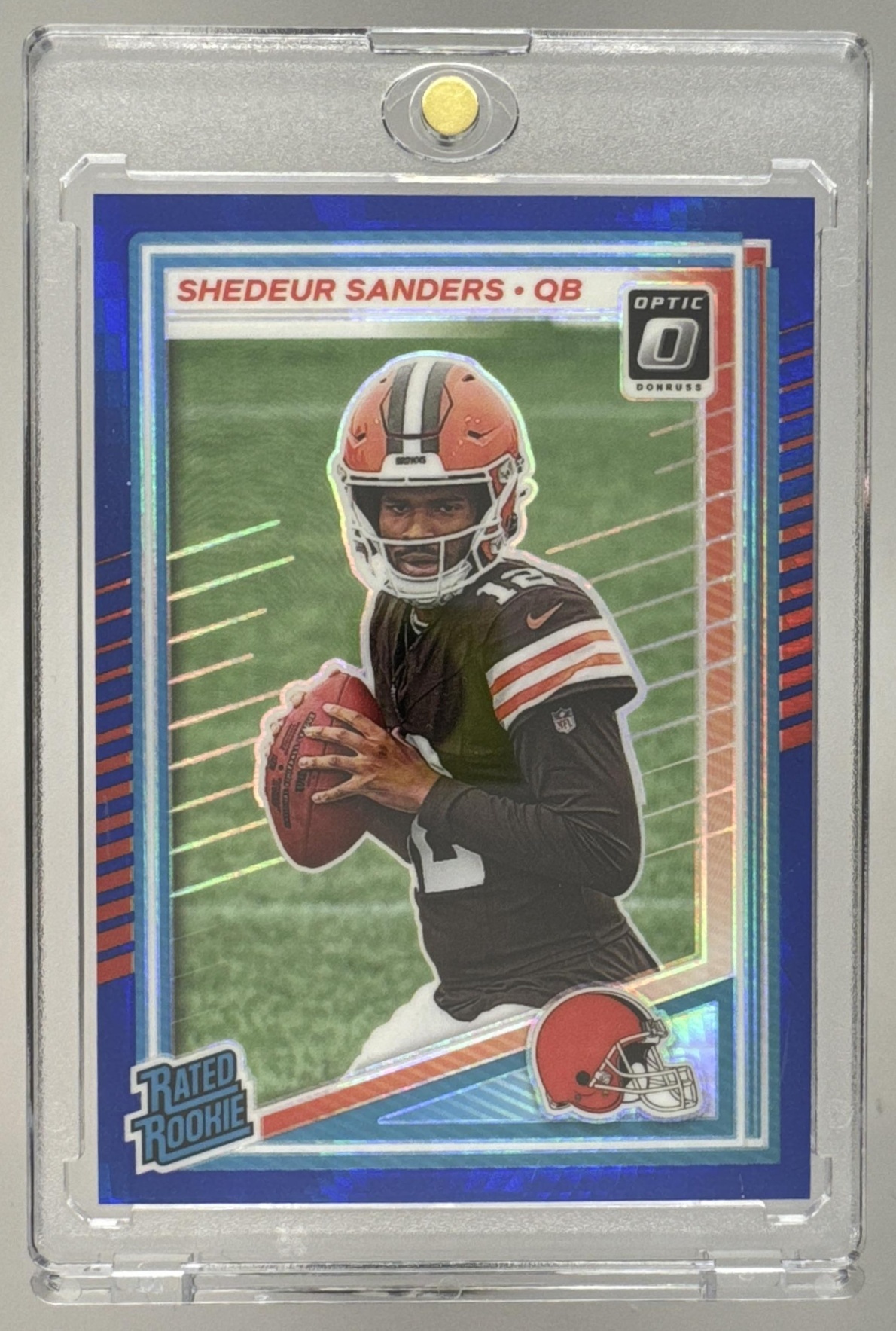 Card image for 2025 Panini Donruss Optic Shedeur Sanders Rated Rookie Holo Prizm #203 Browns