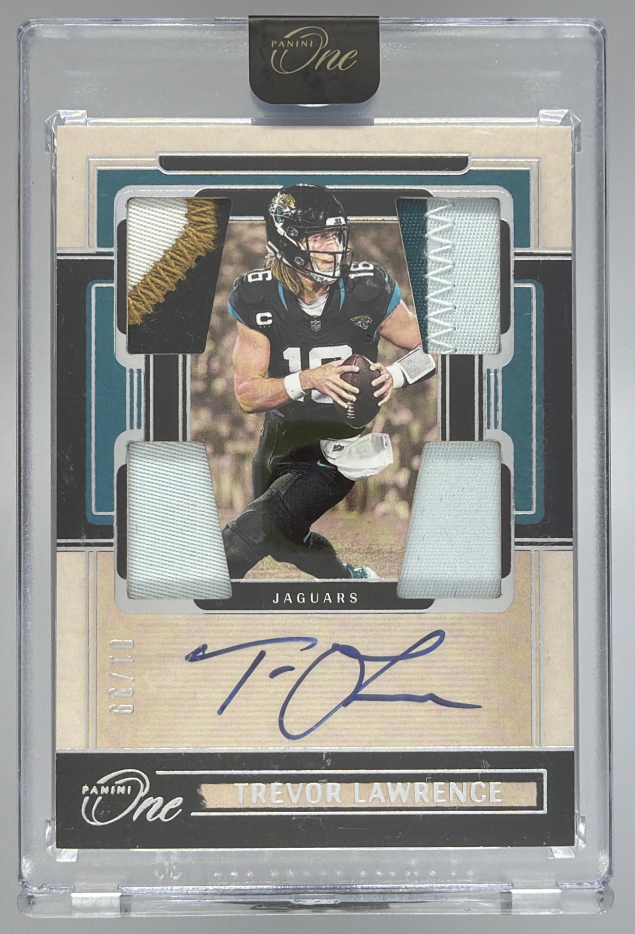 Card image for 2024 Panini One Trevor Lawrence Quad Patch Auto /99 #51 MEM Jaguars