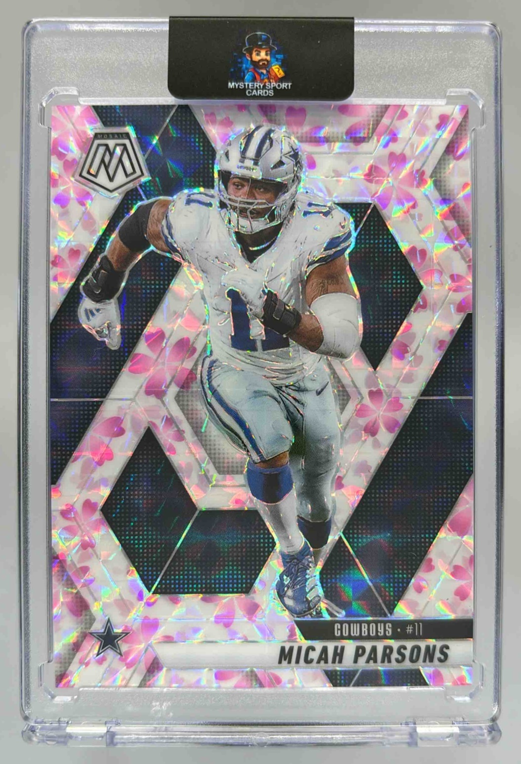 Card image for 2025 Panini Mosaic Micah Parsons Choice Cherry Blossom Prizm /20 #110 Cowboys