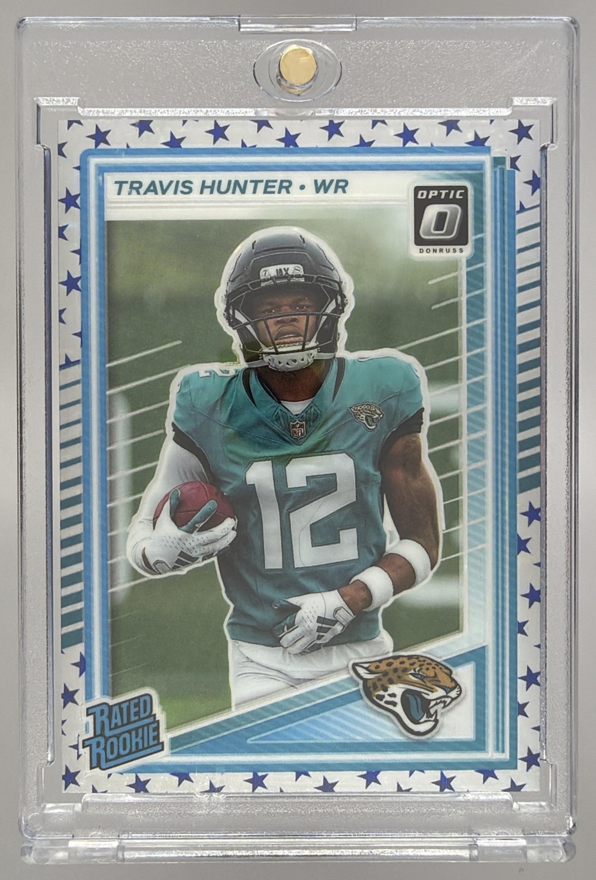 Card image for 2025 Panini Donruss Optic Travis Hunter Rated Rookie Green Hyper Prizm #201 Jaguars
