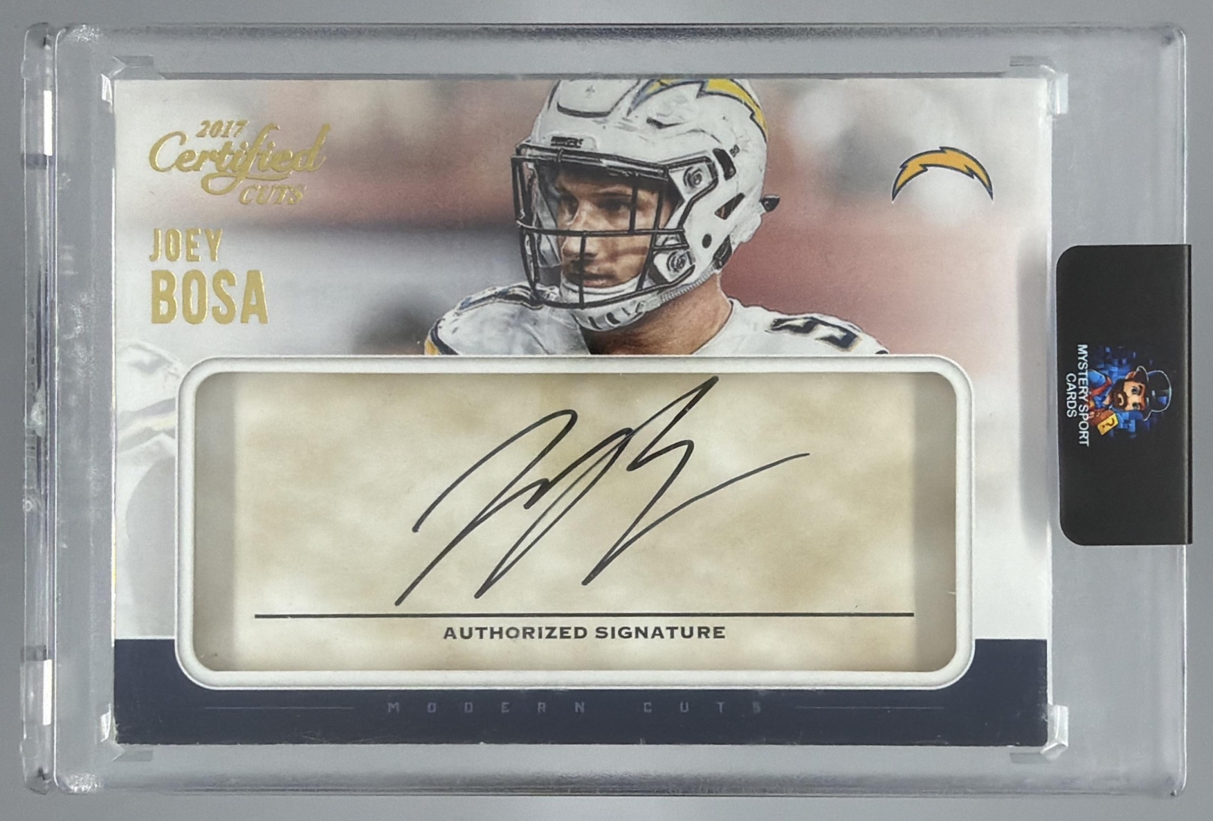Card image for 2017 Panini Donruss Certified Cuts Joey Bosa Modern /99 #MC-JO Auto Chargers