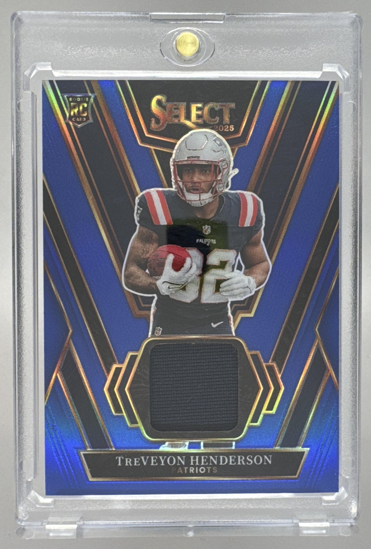 Card image for 2025 Panini Select TreVeyon Henderson Rookie Swatches Red Prizm #RSW-THN RC Patriots