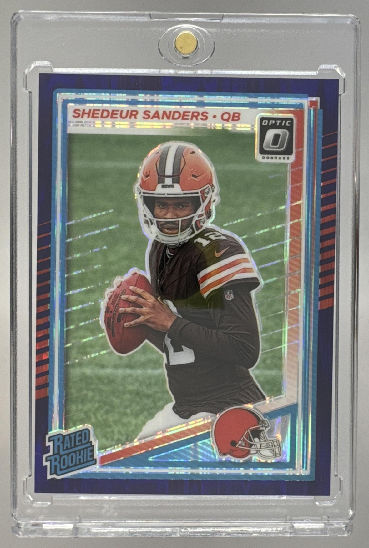 Card image for 2025 Panini Donruss Optic Shedeur Sanders Rated Rookie Purple Shock Prizm #203 Browns