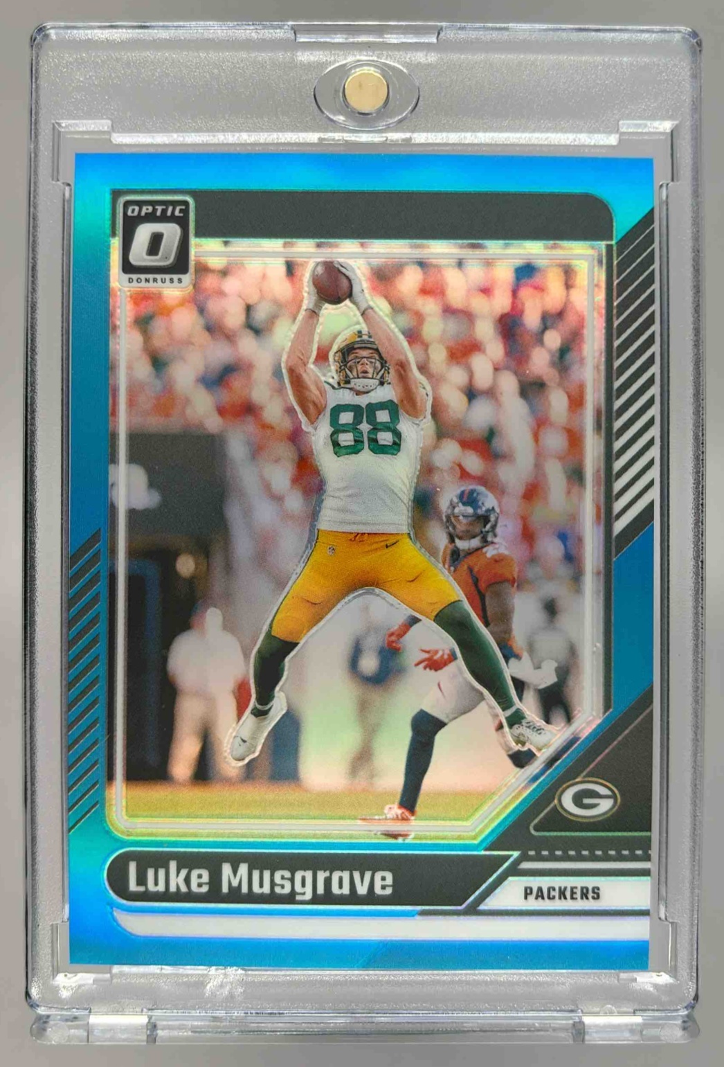 Card image for 2024 Panini Football Donruss Optic Luke Musgrave Aqua /299 #73 Green Bay Packers