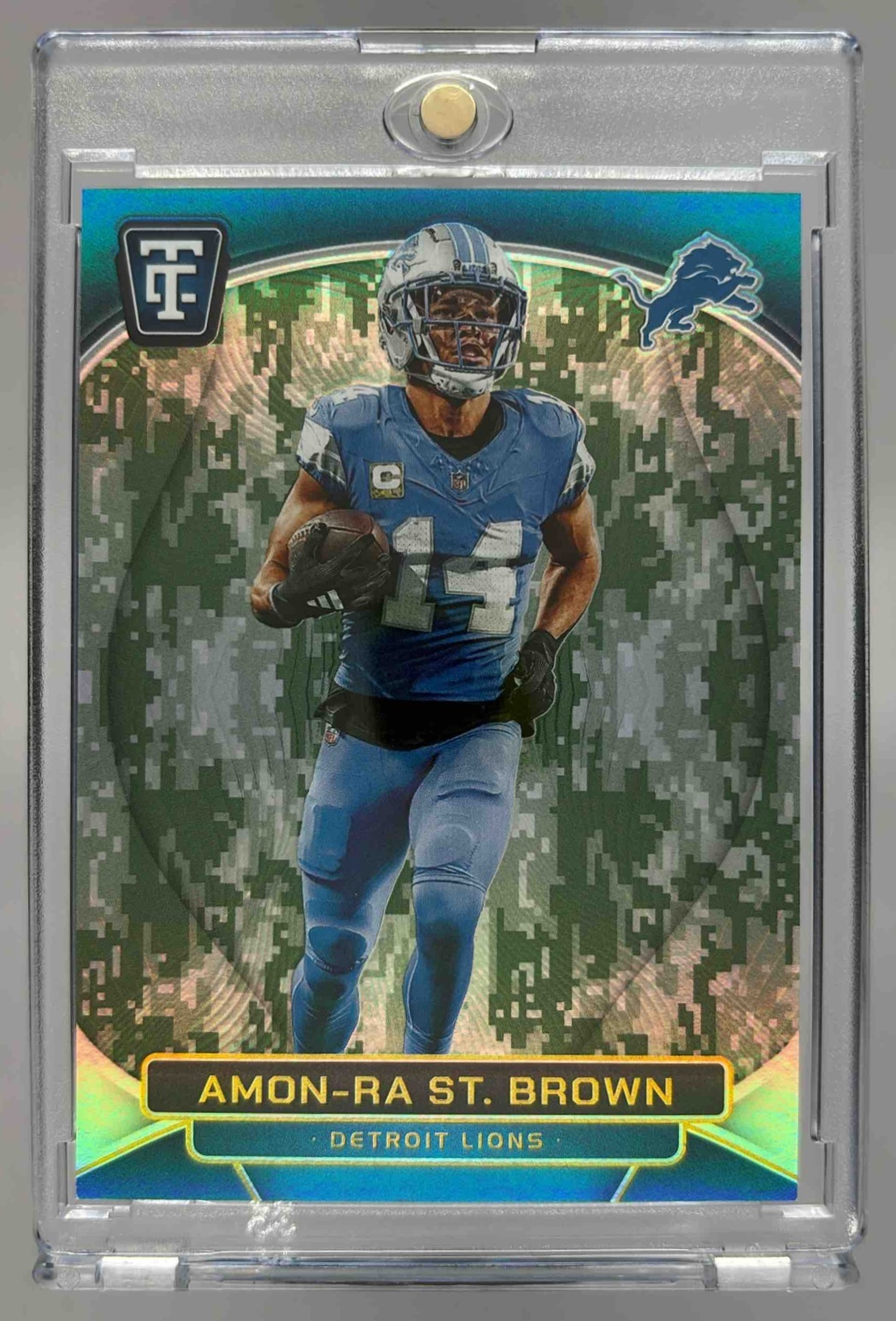 Card image for 2024 Panini Totally Certified Amon-Ra St. Brown Mirror Platinum Camo /35 #28 Lions