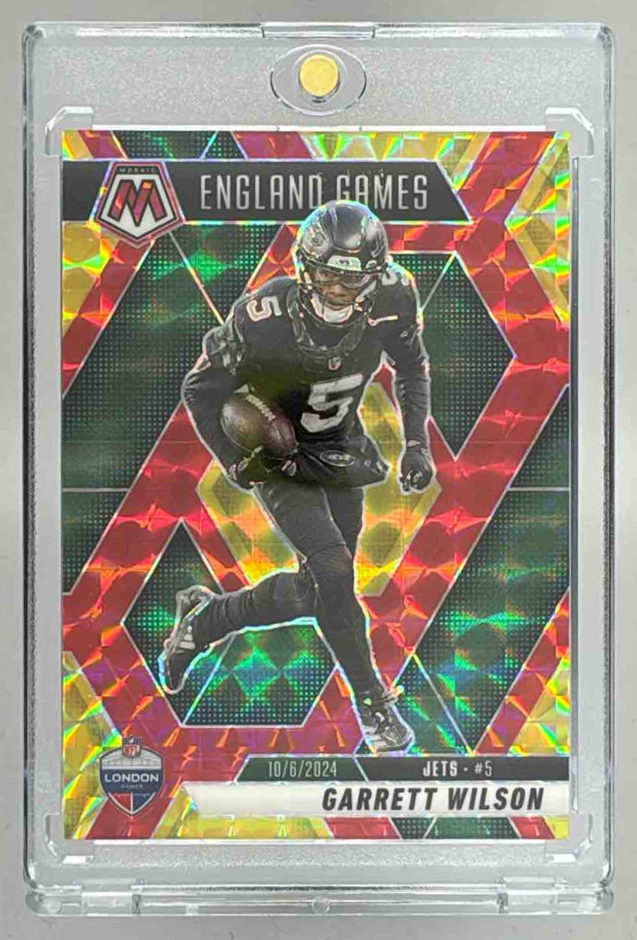 Card image for 2025 Panini Mosaic Garrett Wilson International Games Choice Fusion Red & Yellow Prizm /89 #252 Jets