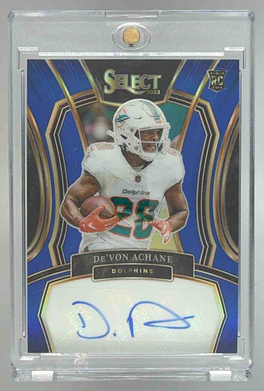 Card image for 2023 Panini Select De'Von Achane Rookie Signatures Blue Prizm /99 #RSI-DAC Auto RC Dolphins