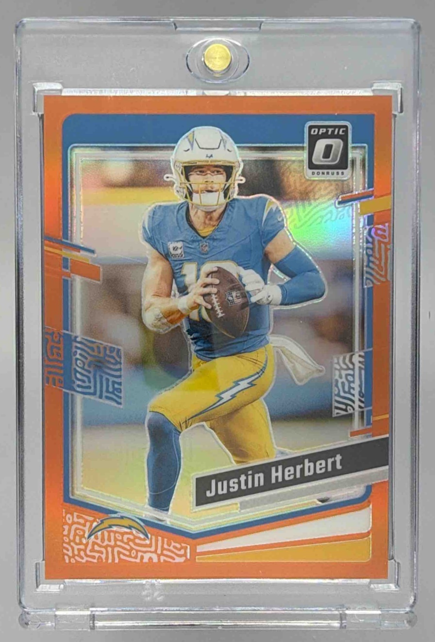 Card image for 2023 Panini Donruss Optic Justin Herbert Orange Prizm /249 #104 Chargers