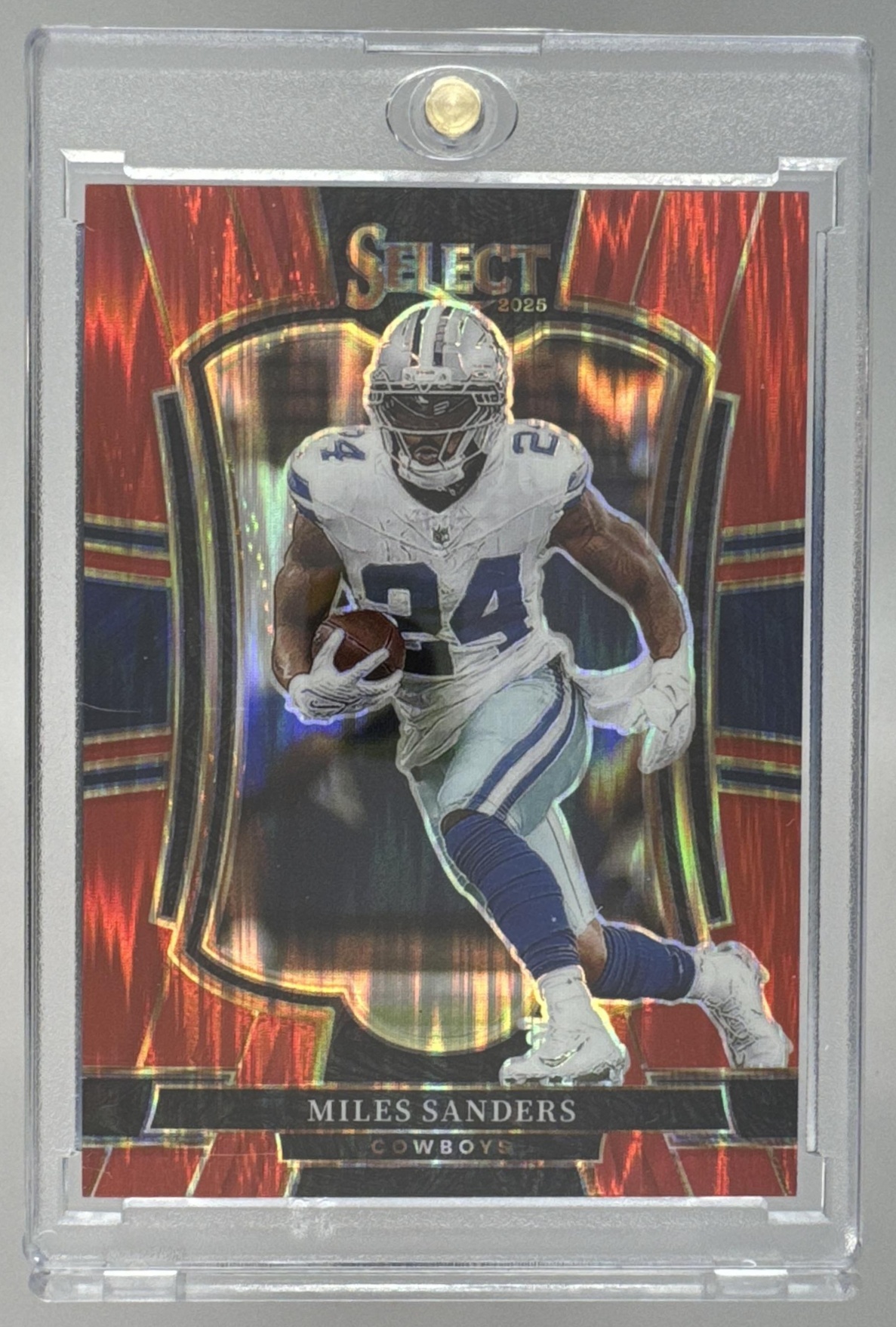 Card image for 2025 Panini Select Miles Sanders Premier Level Red Prizm Shock /249 #198 Cowboys