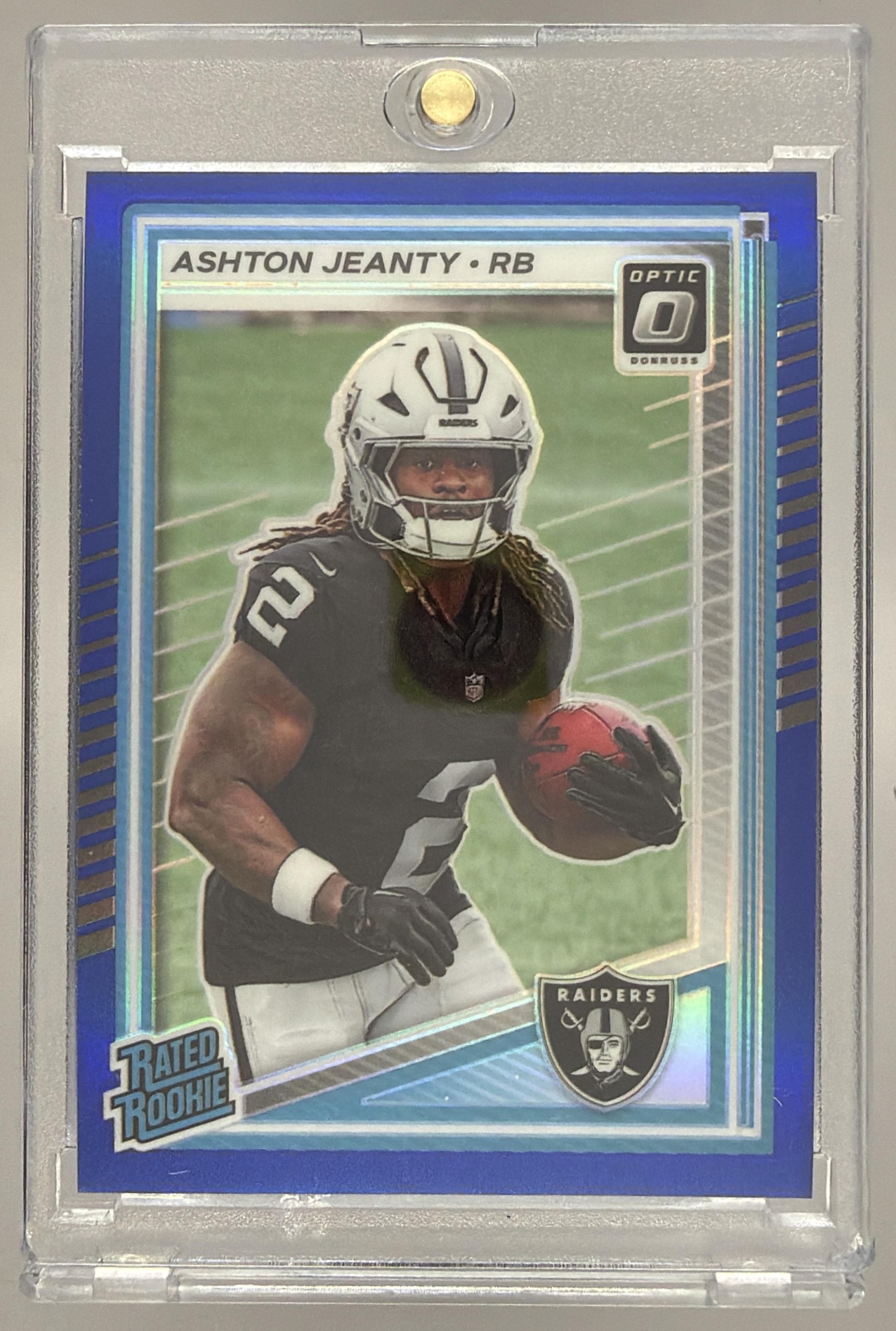 Card image for 2025 Panini Donruss Optic Ashton Jeanty Rated Rookie Blue Prizm /249 #202 Raiders